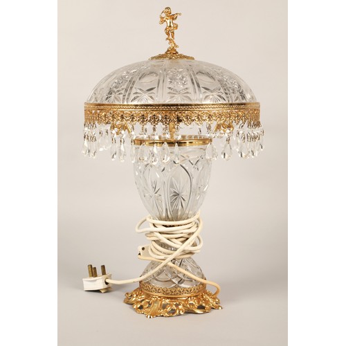 249 - Two crystal lamps with ornate brass bases and brass, beaded shade borders. Height (excluding shades)... 