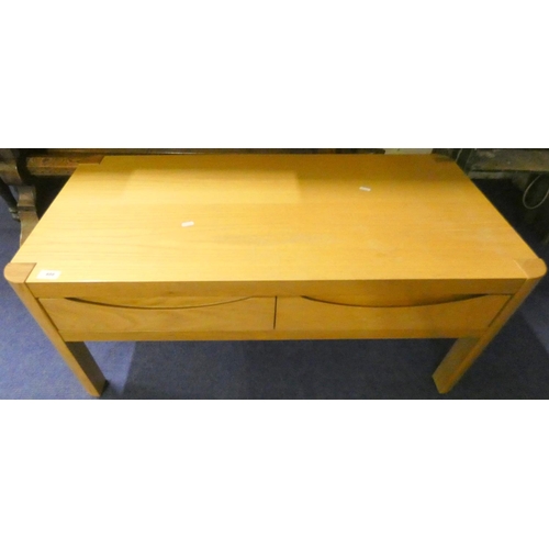 488 - Light oak modern coffee table with two drawers.