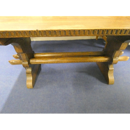 498 - In the manner of Jack Grimble oak refectory table with detachable plank top and beam supports.