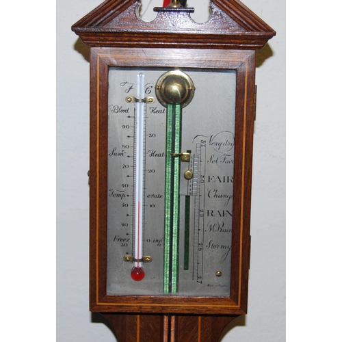 188 - Edwardian inlaid mahogany stick barometer in the George III style with glazed viewing window enclosi... 