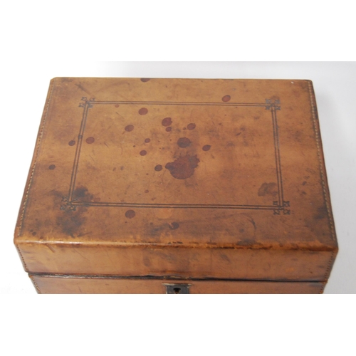 297 - Victorian tooled portable chemist's box containing glass bottles within a fitted interior, bearing a... 