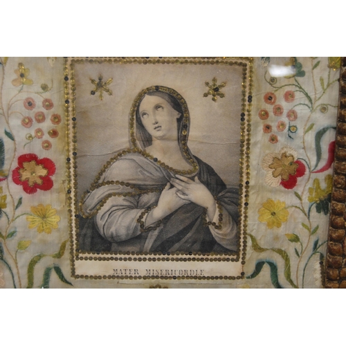 401 - French embroidery on silk, c. 18th century, with a printed black and white portrait of the Virgin Ma... 