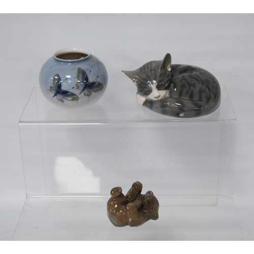 217 - Three pieces of Royal Copenhagen porcelain modelled as a sleeping cat, a bear and an oviform spill v... 