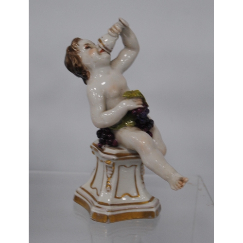 218 - Pair of 19th century Naples porcelain figures modelled as scantily-clad putti with a bird and dog, 1... 