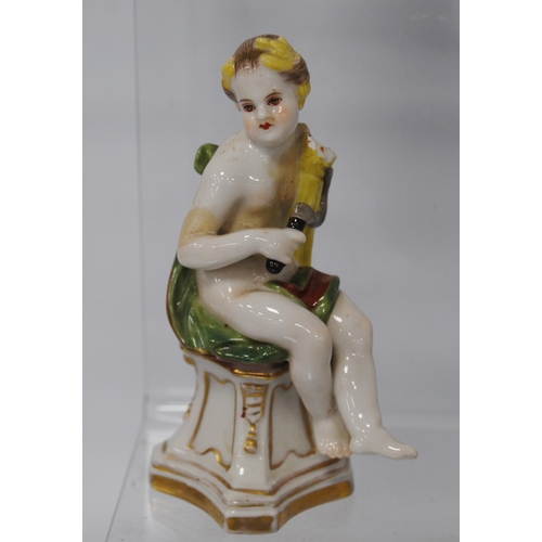 218 - Pair of 19th century Naples porcelain figures modelled as scantily-clad putti with a bird and dog, 1... 