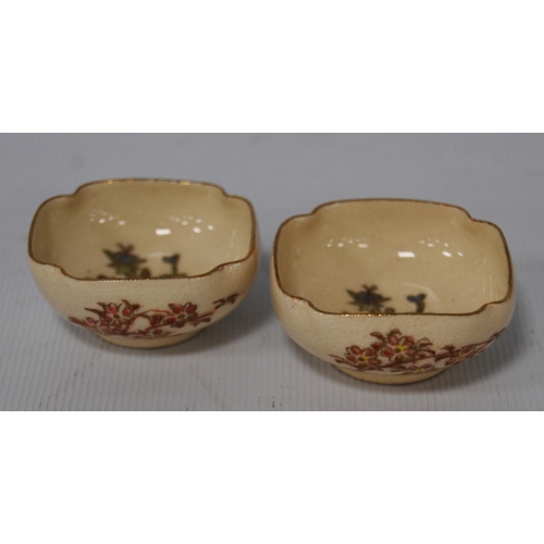 196 - Japanese Kutani bowl in typical colours, decorated with panels of birds and floral sprays to the wel... 