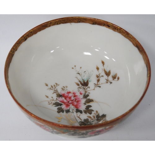 196 - Japanese Kutani bowl in typical colours, decorated with panels of birds and floral sprays to the wel... 