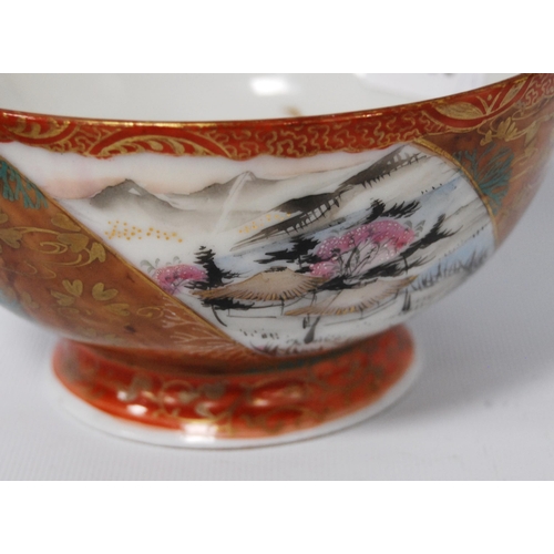 196 - Japanese Kutani bowl in typical colours, decorated with panels of birds and floral sprays to the wel... 