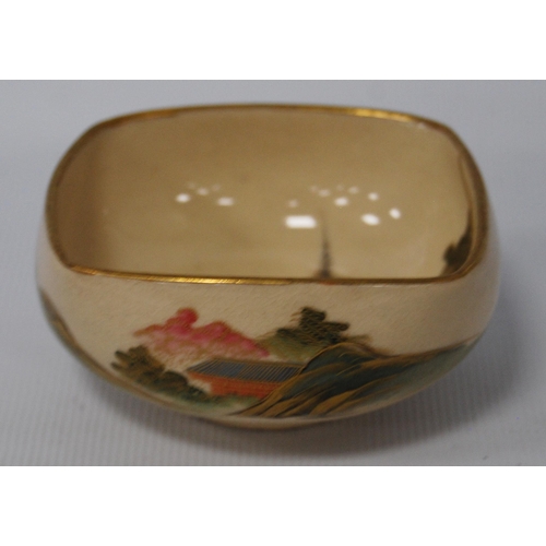 196 - Japanese Kutani bowl in typical colours, decorated with panels of birds and floral sprays to the wel... 