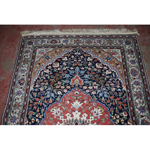 411 - Persian Tabriz hand-knotted rug with large foliate medallion to the centre within all over foliage, ... 