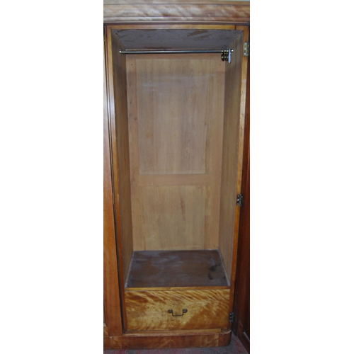 419 - Victorian satinwood wardrobe, the moulded cornice above two doors enclosing open and closed drawers,... 