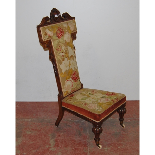 421 - Victorian walnut prie dieu upholstered in floral stuff-over embroidery above velour to the frieze, t... 