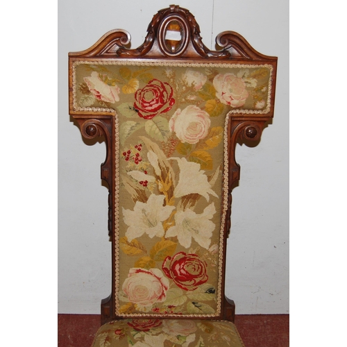 421 - Victorian walnut prie dieu upholstered in floral stuff-over embroidery above velour to the frieze, t... 