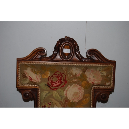 421 - Victorian walnut prie dieu upholstered in floral stuff-over embroidery above velour to the frieze, t... 