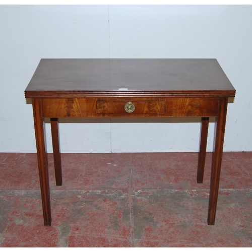 426 - Georgian mahogany tea table, circa early 19th century, with fold over top above a short drawer, on c... 