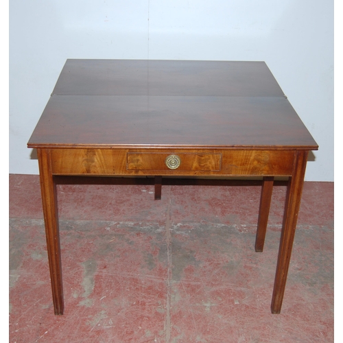 426 - Georgian mahogany tea table, circa early 19th century, with fold over top above a short drawer, on c... 