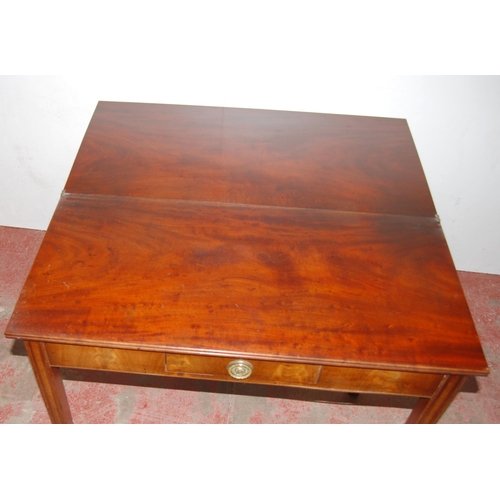 426 - Georgian mahogany tea table, circa early 19th century, with fold over top above a short drawer, on c... 