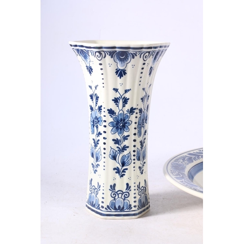 107 - Royal Goedewaggen Blue Delft flaring vase, 21cm high, and a matching charger.