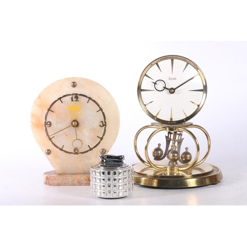 11 - Calibri table lighter, an onyx mantel clock, and a Kundo mantel clock.