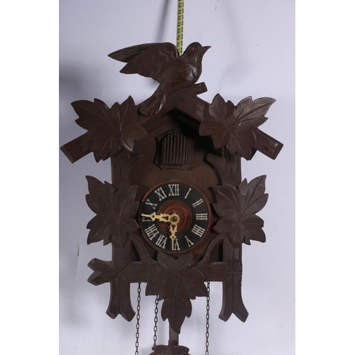 115 - Black Forest style cuckoo clock.