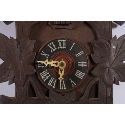 115 - Black Forest style cuckoo clock.