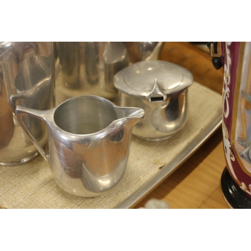 126 - Four piece Picquot Ware service on tray.