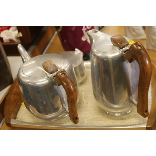 126 - Four piece Picquot Ware service on tray.