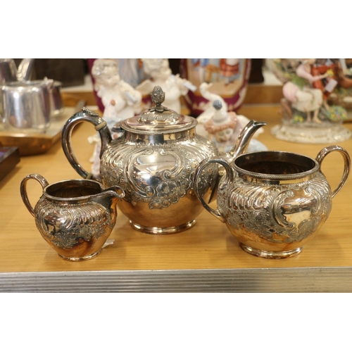 130 - Floral decorated three-piece EPNS tea service by Mappin Brothers.