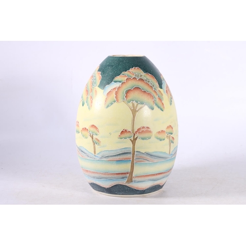 135 - Italian Art Pottery vase decorated with colour trees in a landscape, 27cm high.