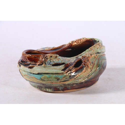 137 - Abstract Studio Pottery dish of naturalistic form and texture, indistinctly signed to base, 17cm wid... 