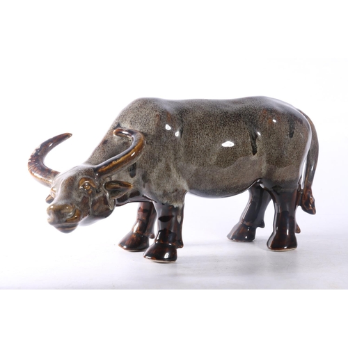 15 - Two ceramic buffalo models.