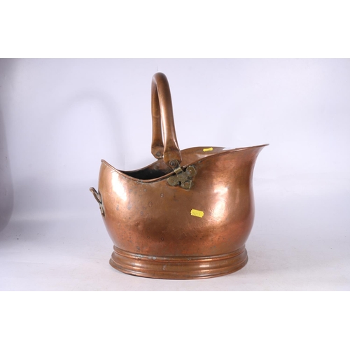 151 - Copper helmet coal scuttle.