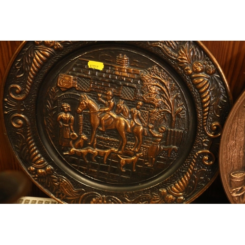 158 - Two brass wall plaque, and a bronzed plaster wall plaque.