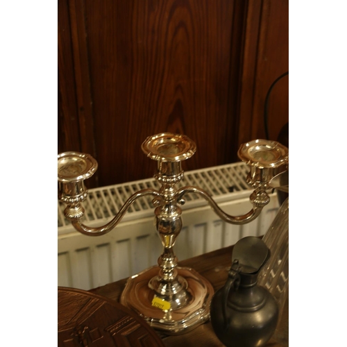 159 - Metal and brass ware to include a three branch candelabra, a silver-plate and glass water jug, etc.