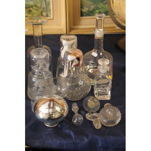 16 - Glass decanters to include a Holmegaard style mallet shaped decanter, stoppers, etc.