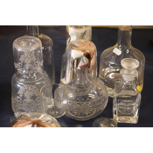 16 - Glass decanters to include a Holmegaard style mallet shaped decanter, stoppers, etc.