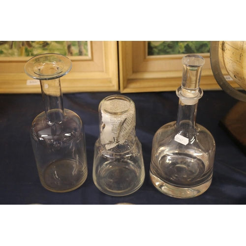 16 - Glass decanters to include a Holmegaard style mallet shaped decanter, stoppers, etc.