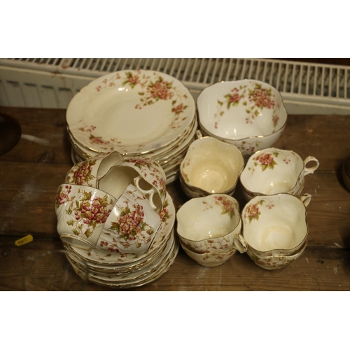 160 - Edwardian part teaset decorated with pink flowers and vines.