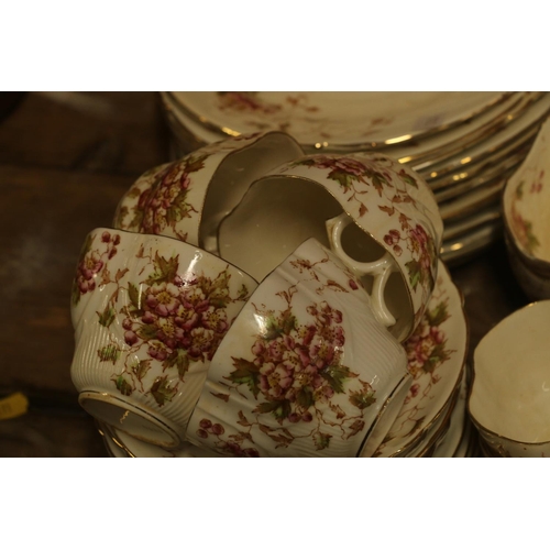 160 - Edwardian part teaset decorated with pink flowers and vines.