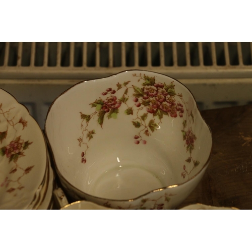 160 - Edwardian part teaset decorated with pink flowers and vines.