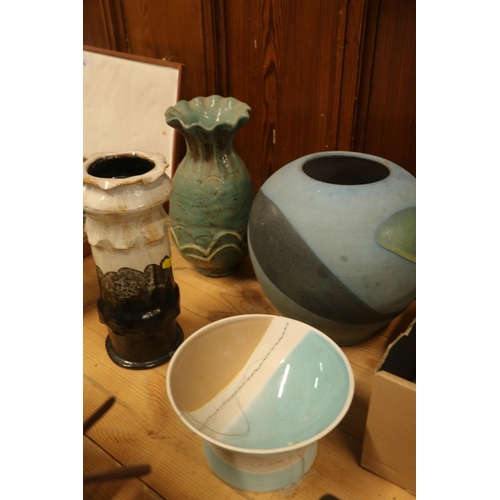 166 - Three Studio Pottery vases and a Studio Pottery bowl on pedestal base, largest 25cm high.