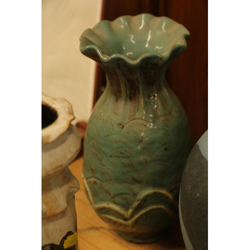 166 - Three Studio Pottery vases and a Studio Pottery bowl on pedestal base, largest 25cm high.