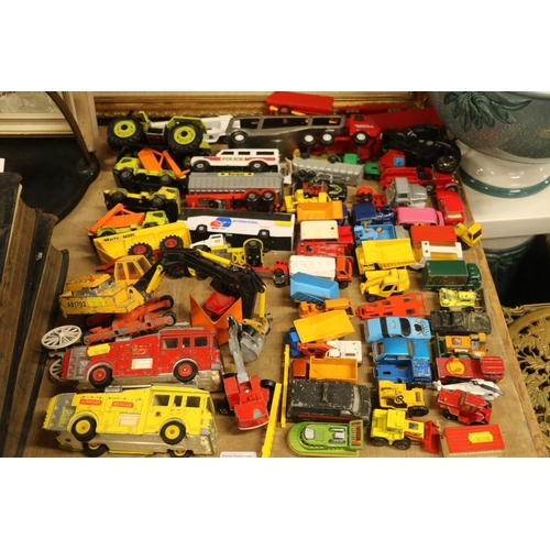 199 - Die-cast model vehicles to include a Dinky Toys fire engine and tender, a Britains model tractor, a ... 