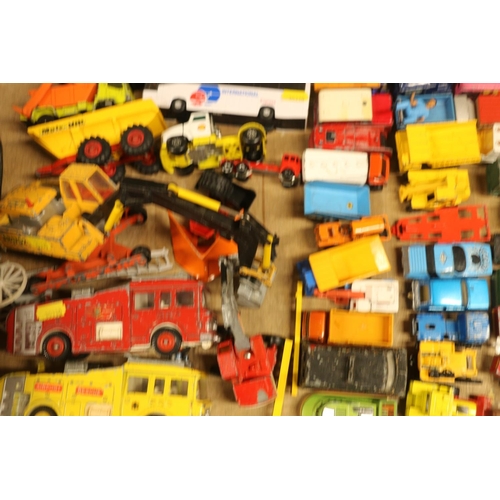 199 - Die-cast model vehicles to include a Dinky Toys fire engine and tender, a Britains model tractor, a ... 