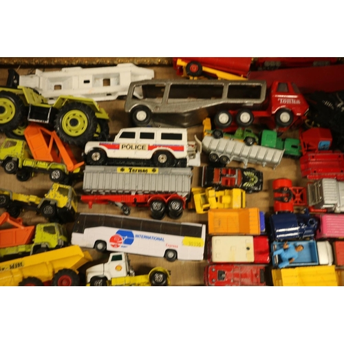 199 - Die-cast model vehicles to include a Dinky Toys fire engine and tender, a Britains model tractor, a ... 