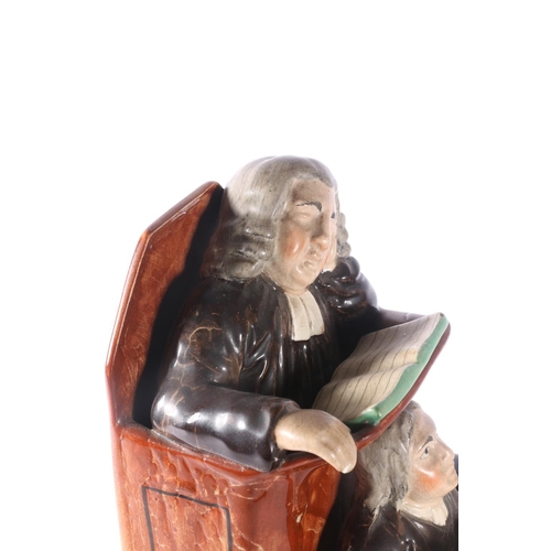 20 - 19th century Staffordshire model Vicar and Moses in the pulpit.