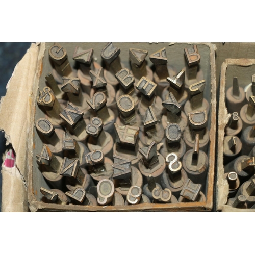 203 - Box containing vintage letter punches.