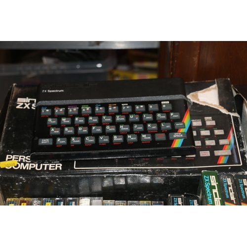 207 - ZX Spectrum games console with games and joysticks, and a Timex Sinclair 2040 personal printing mach... 