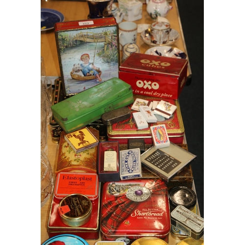 213 - Vintage tins to include OXO, a Japanese tin, etc.