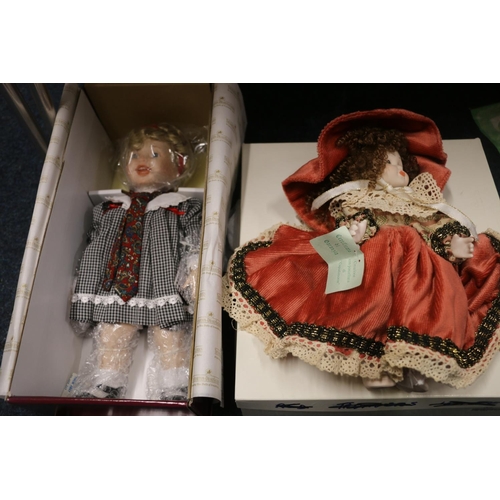 214 - Italian Capodimonte doll, an Ashton Drake doll, boxed, a Royal Heirloom doll, and another.